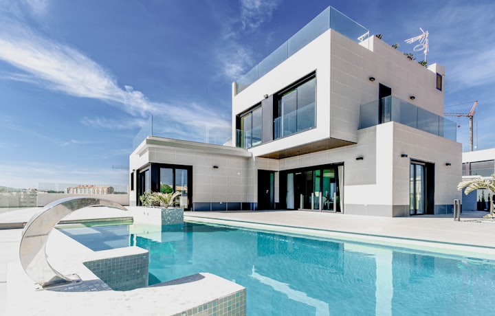 Crystal-clear backyard pool with wooden deck